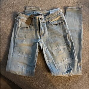 Distressed Light Blue Jeans